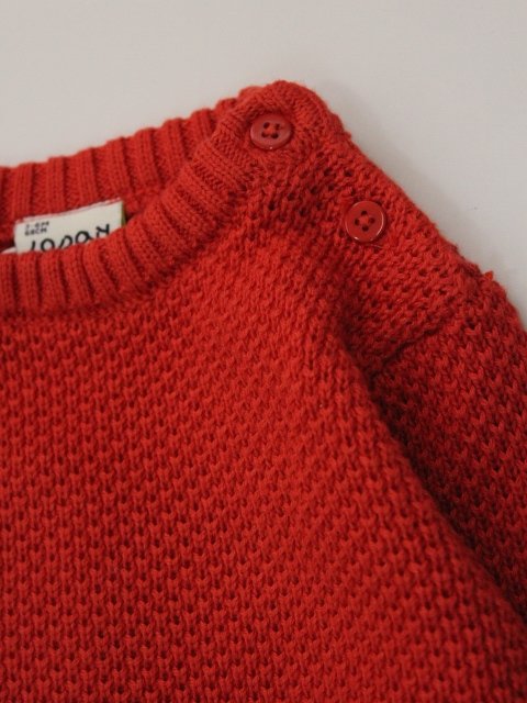 suéter tejido color narajna, cuello redondo