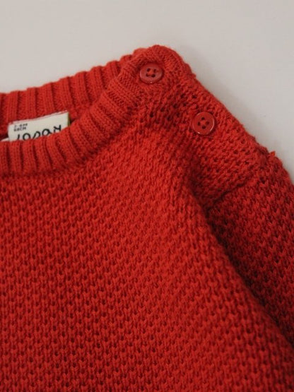 suéter tejido color narajna, cuello redondo