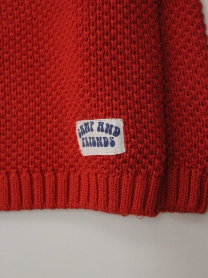 suéter tejido color narajna, cuello redondo