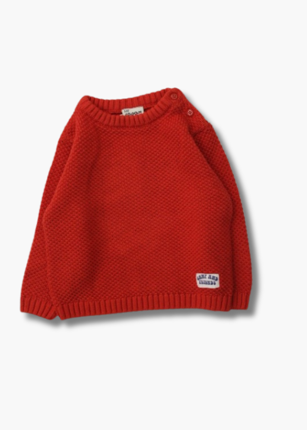 suéter tejido color narajna, cuello redondo