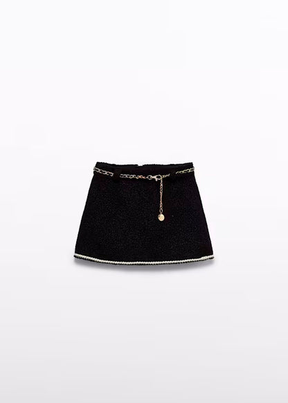 Falda Borreguito color negro cinto dorado