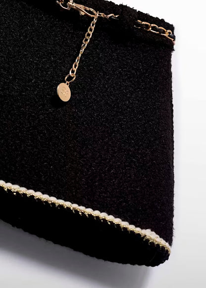 Falda Borreguito color negro cinto dorado