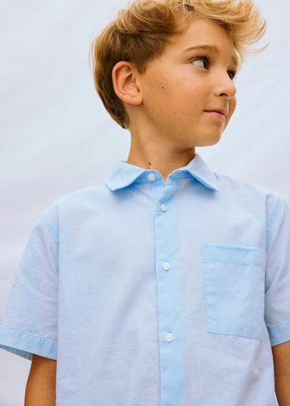 Camisa manga corta color azul celeste
