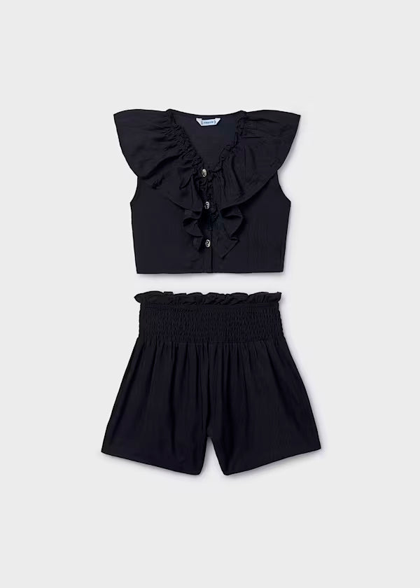 Conjunto pantalón corto y top volante negro chica