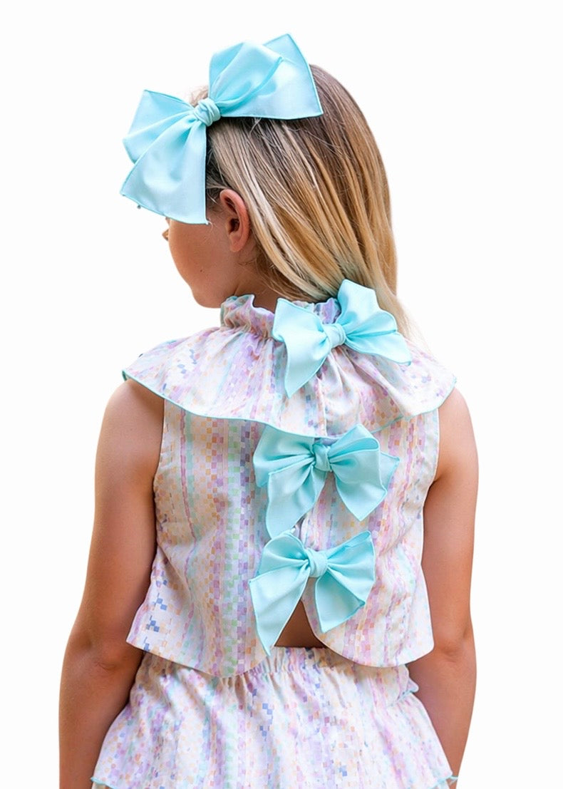 Conjunto blusa y falda tonos pastel, moda española