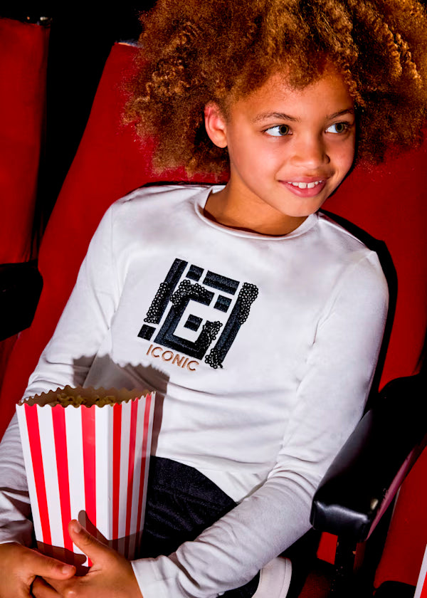 conjunto camiseta manga larga y falda a cuadros