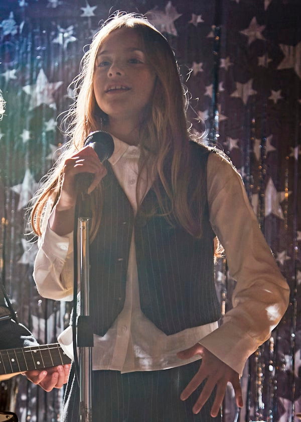 conjunto chaleco y falda a rallas remaches lateral