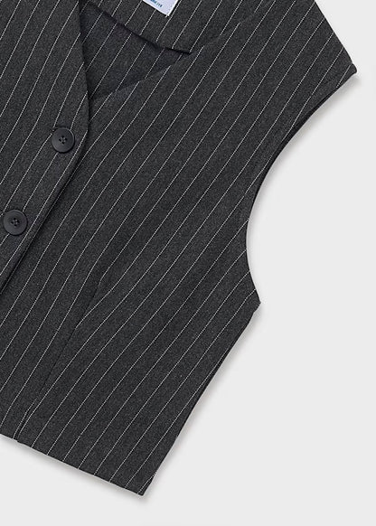 conjunto chaleco y falda a rallas remaches lateral