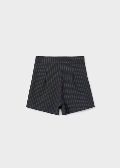 conjunto chaleco y falda a rallas remaches lateral