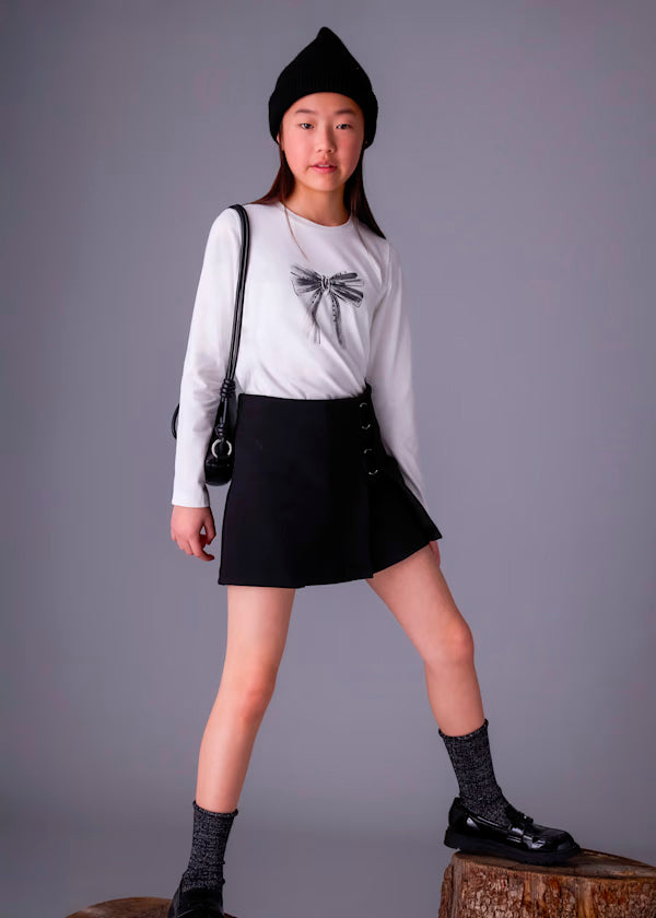 conjunto camiseta manga larga y falda remaches lateral