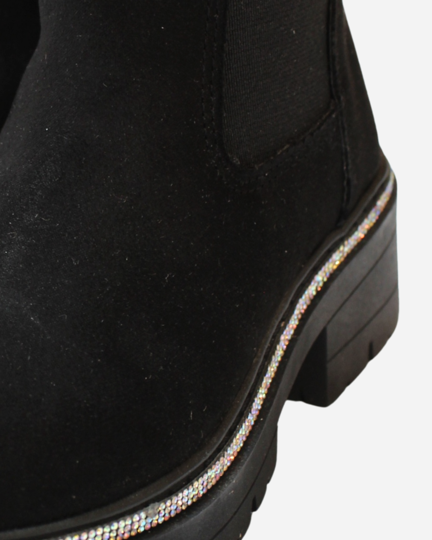 Botin negro tira cristales en suela
