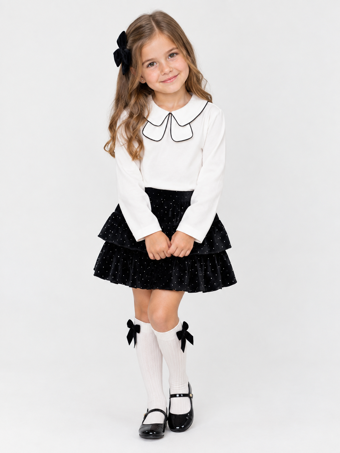 Conjunto blusa manga larga  + falda terciopelo negro