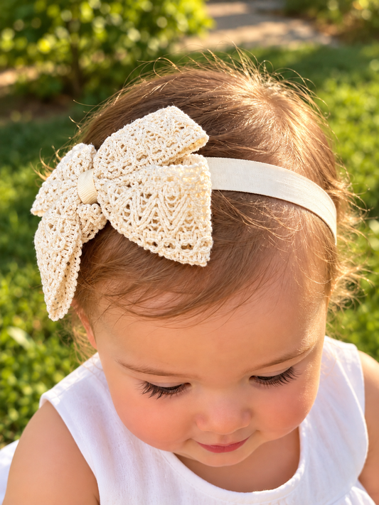 Banda moño cruzado tira bordada