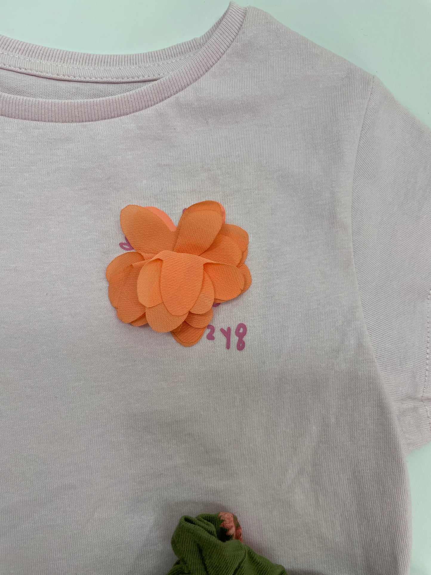 Set blusa lila flor melo con short verde flores