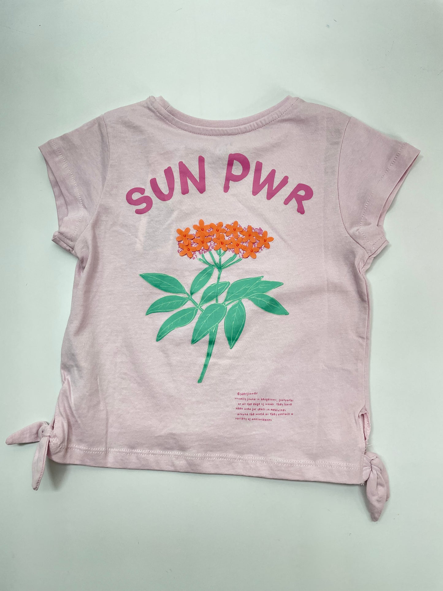 Set blusa lila flor melo con short verde flores