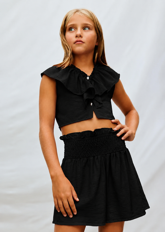 Conjunto pantalón corto y top volante negro chica