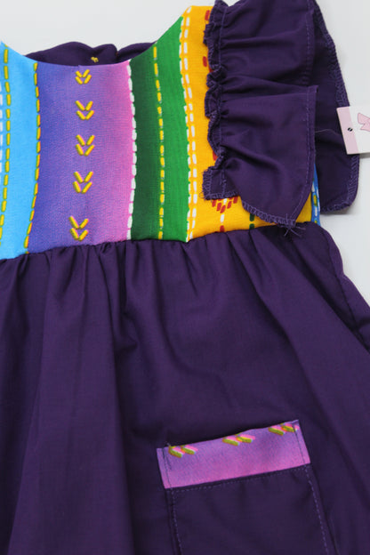 vestido patrio popelina morado con peto a rayas colores azul, amarillo, verde