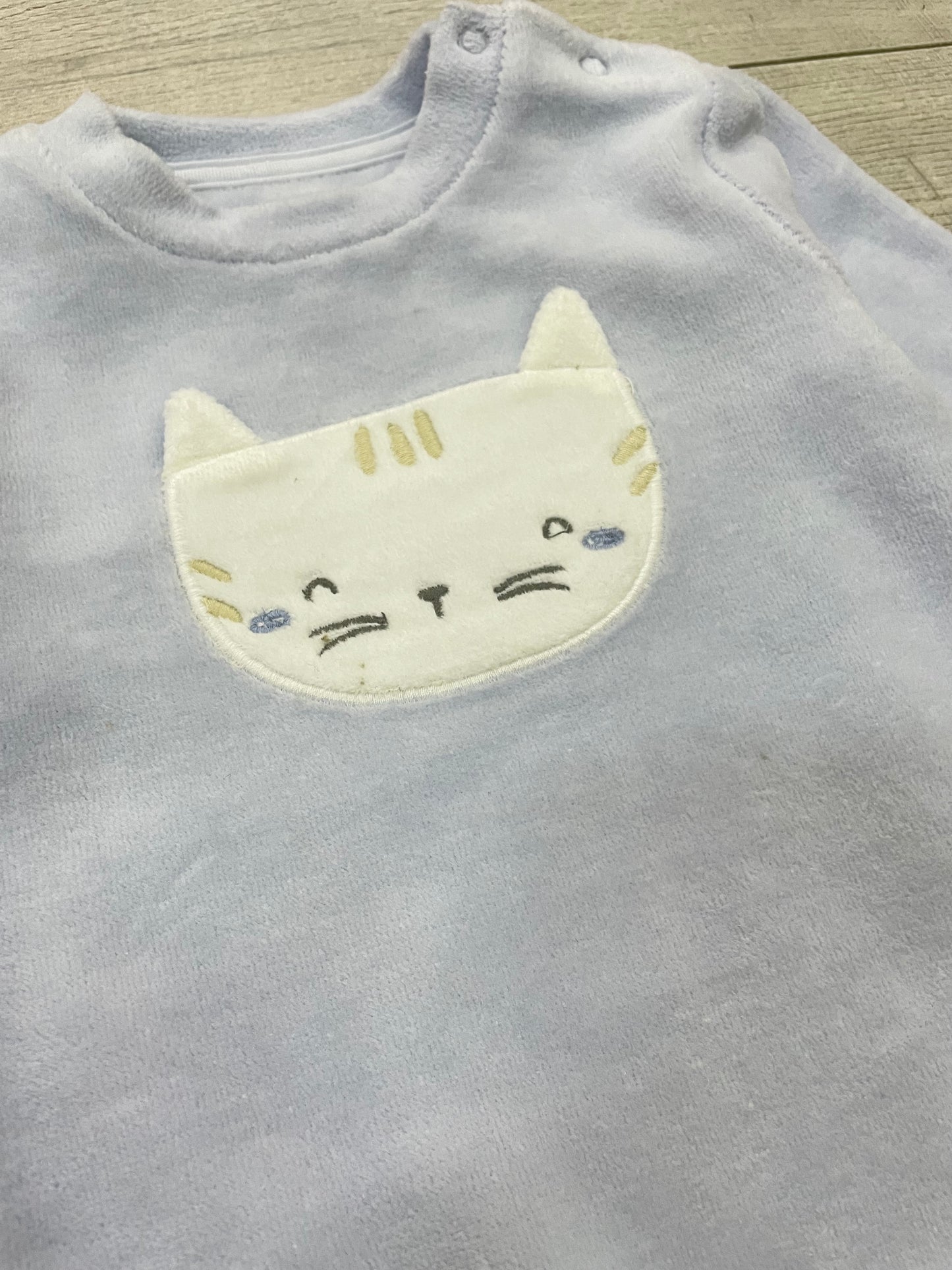 Pelele color malva cara gatito