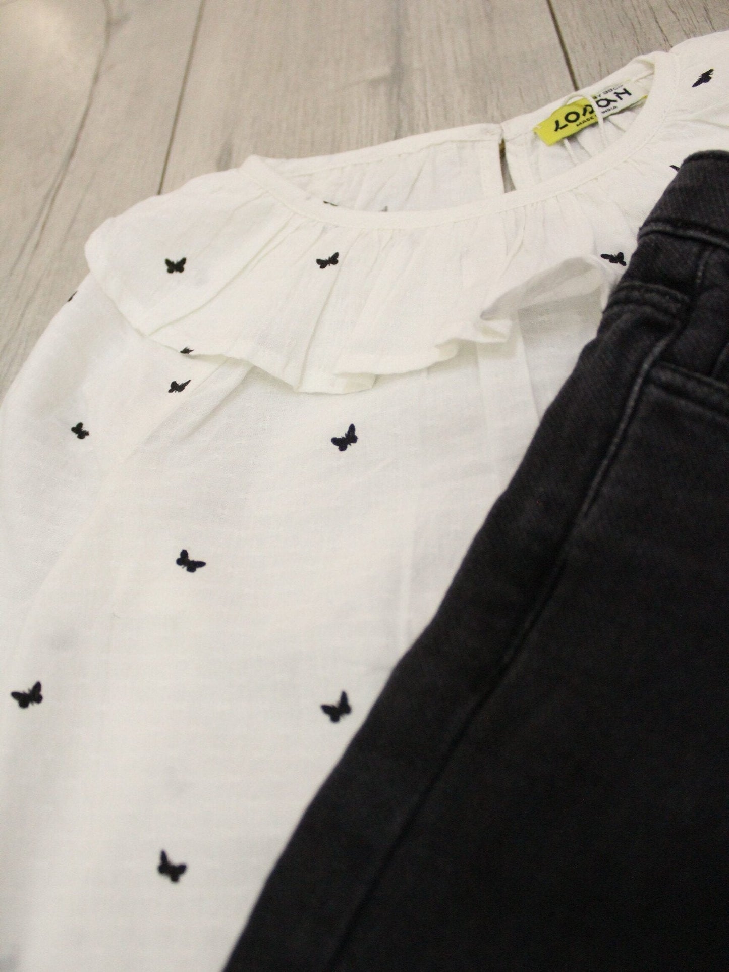 set falda blusa dobby con pantalón campanas black denim