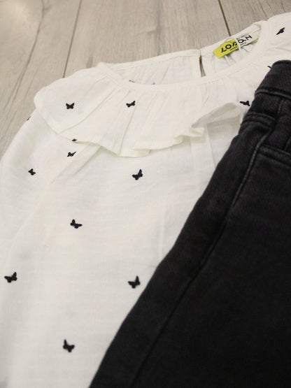 set falda blusa dobby con pantalón campanas black denim