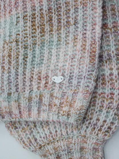 suéter tejido rosa claro