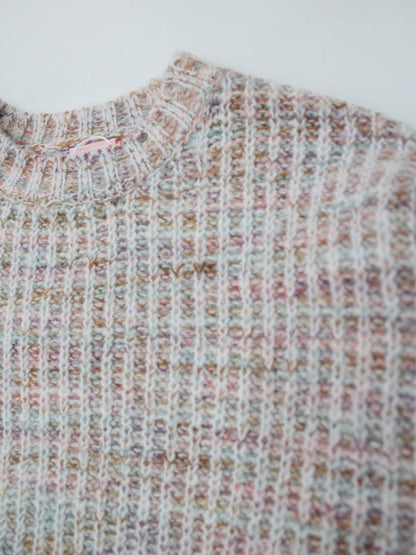 suéter tejido rosa claro