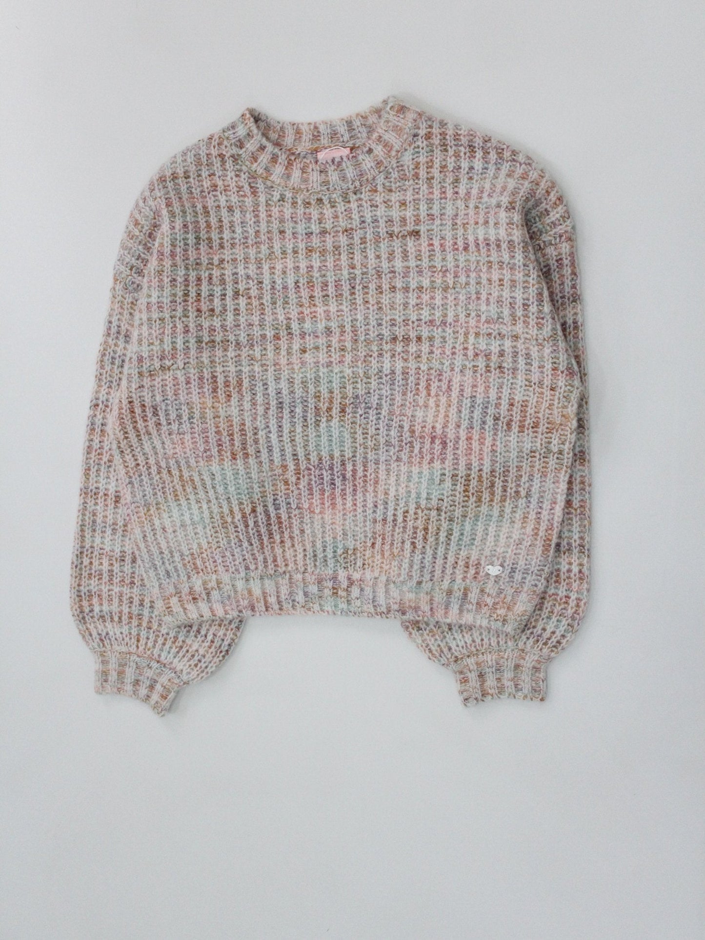 suéter tejido rosa claro