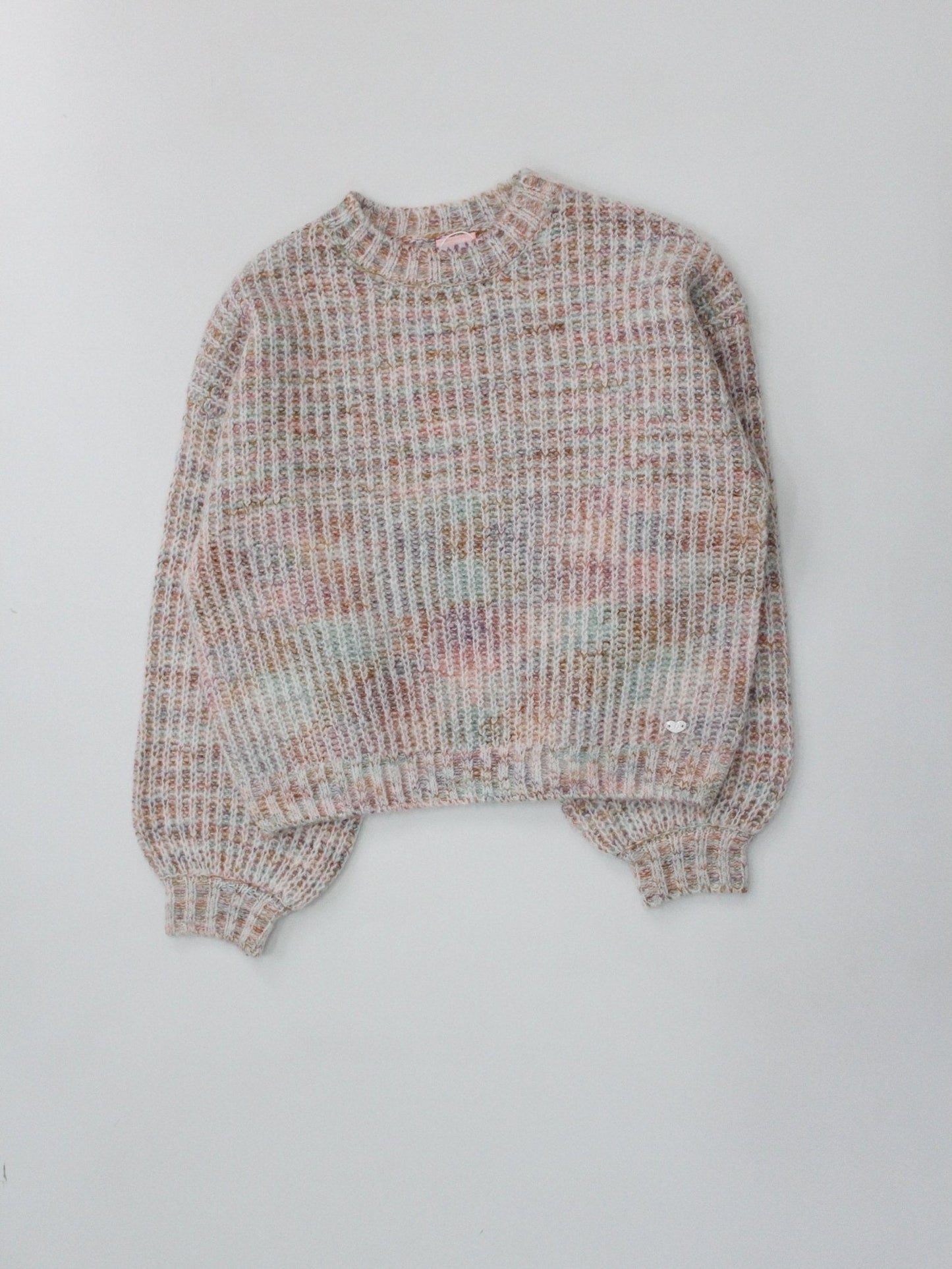 suéter tejido rosa claro