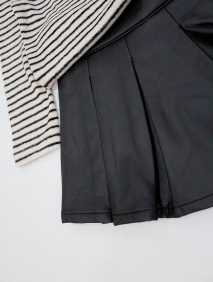 set camiseta con falda de cuero sintético color negro