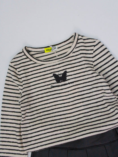 set camiseta con falda de cuero sintético color negro