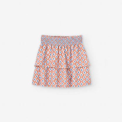 Set blusa blanca falda olanes naranja