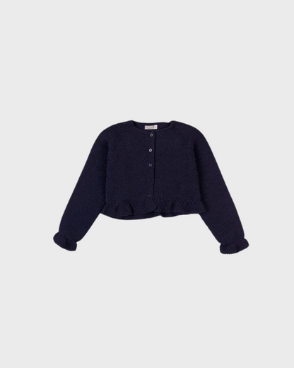 chaqueta con volantes en los puños