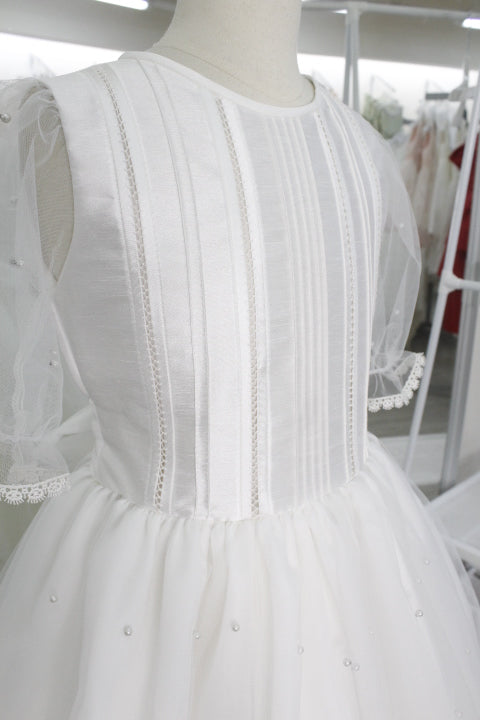 Vestido comunión falda perlas, manga tres cuartos