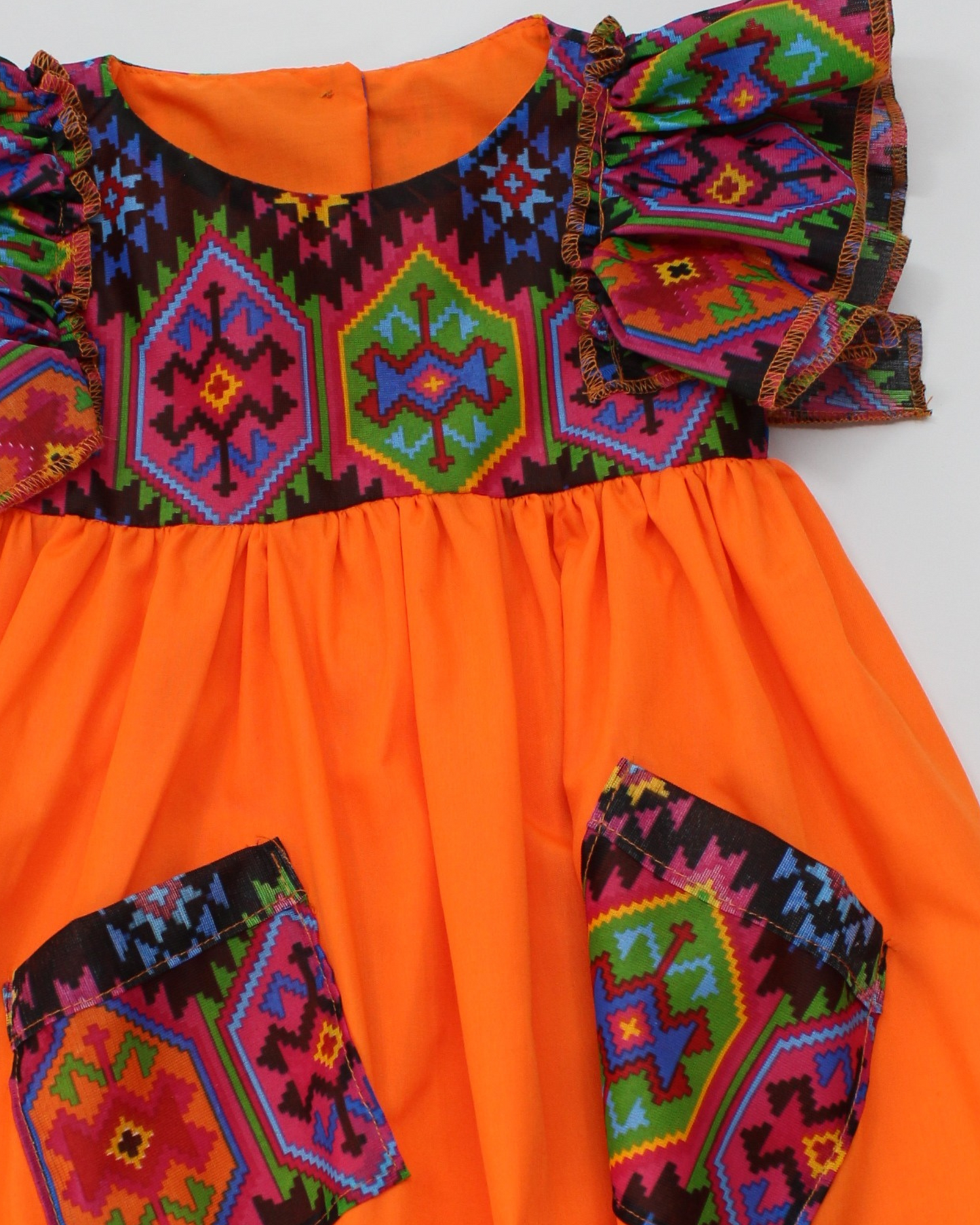 vestido patrio popelina naranja con peto textura morada y negro