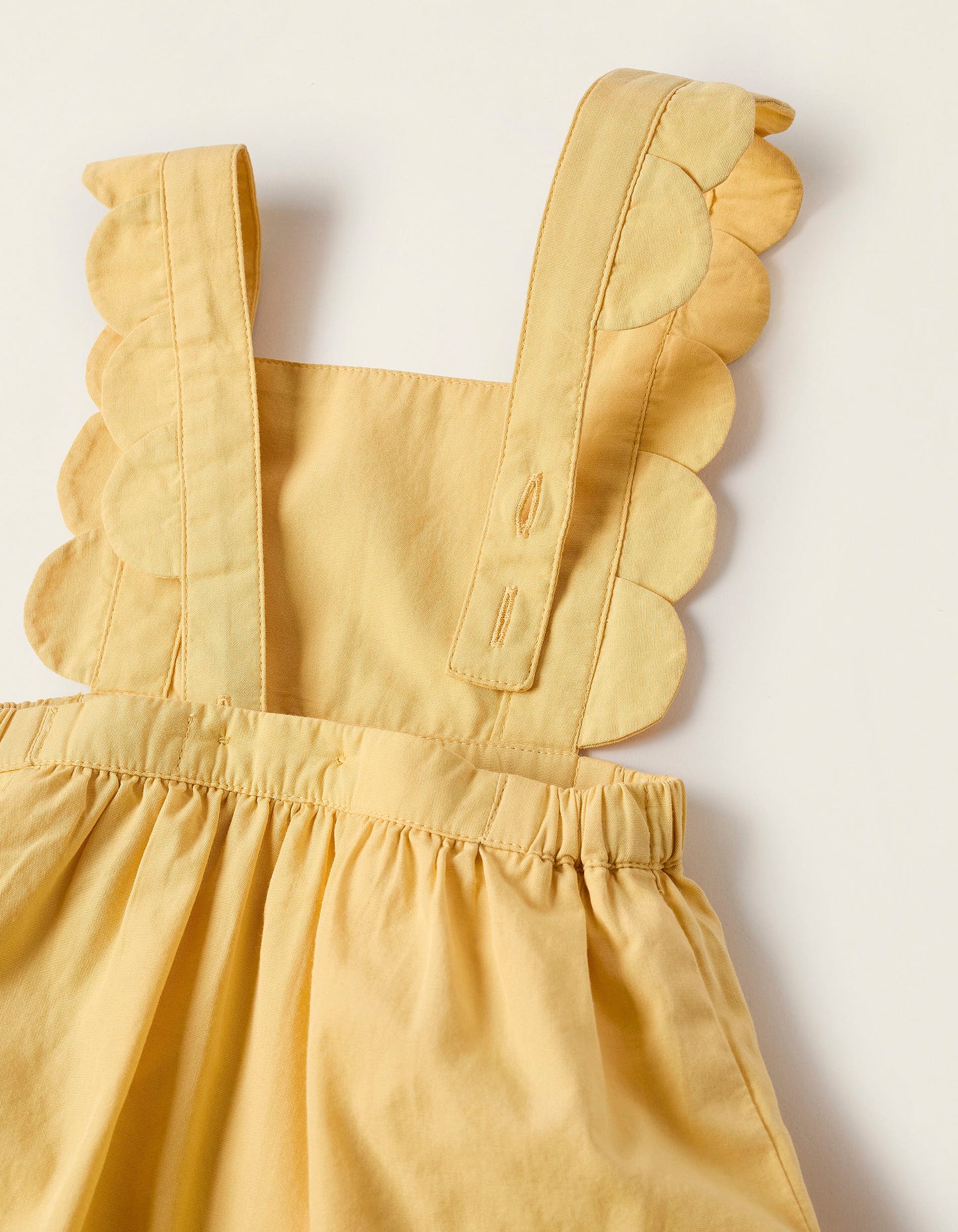 Set vestido y peto amarillo para niña