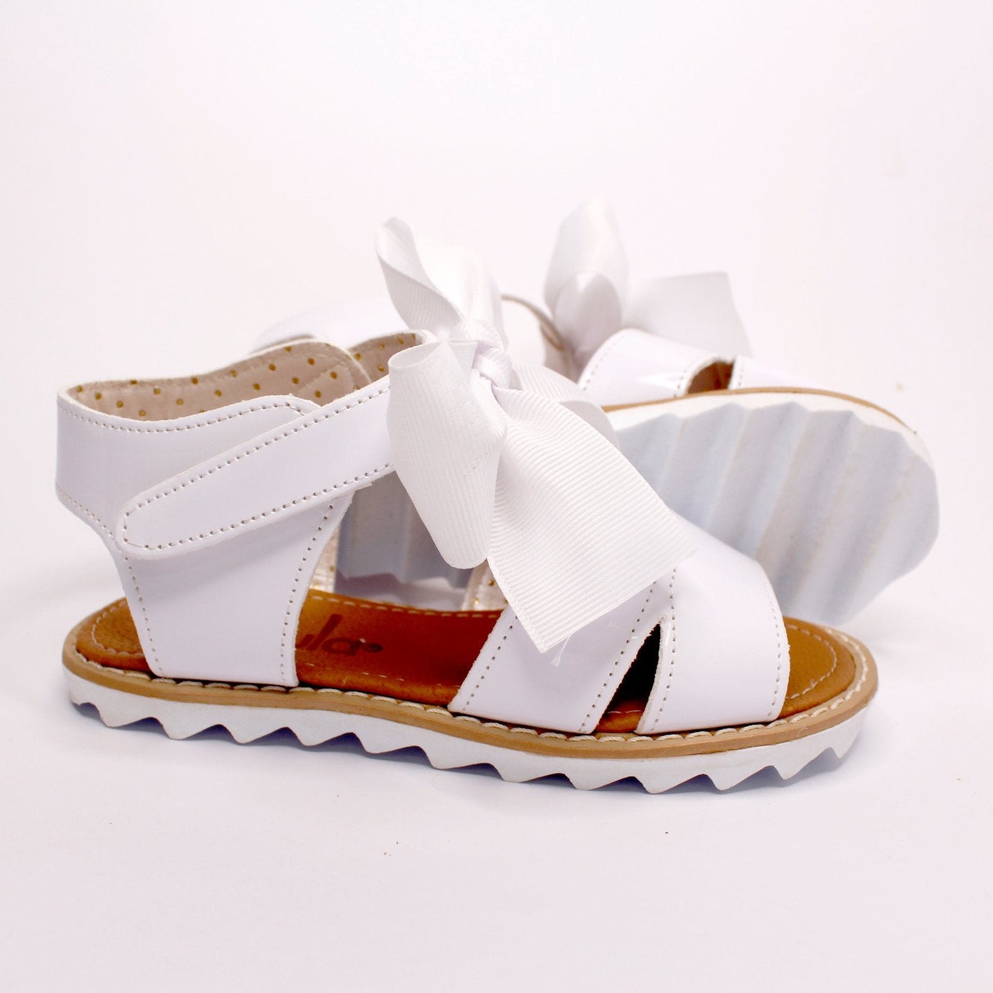huarace blanco con liston y suela blanca