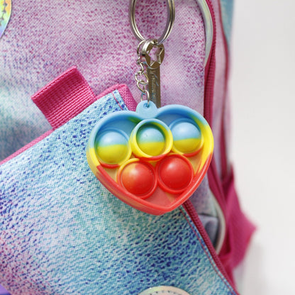 set mochila, lapicera y lonchera tema corazón popit holográfico