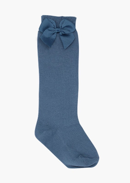 calceta alta con moño marca babine