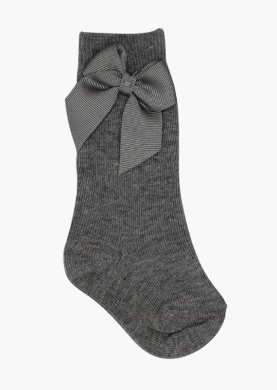 calceta alta con moño marca babine