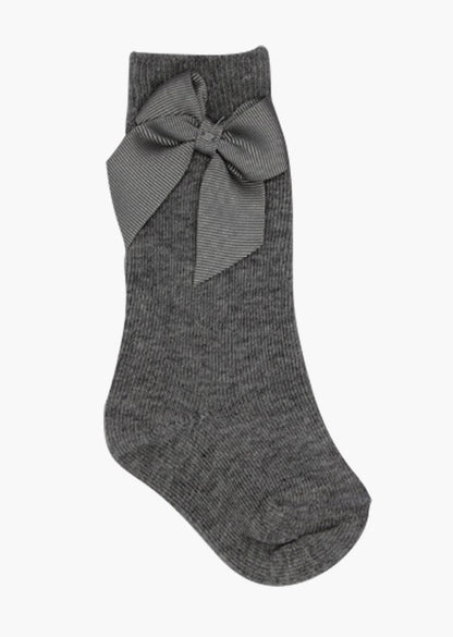 calceta alta con moño marca babine