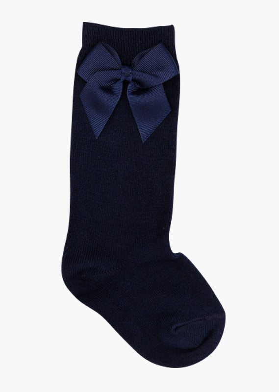 calceta alta con moño marca babine