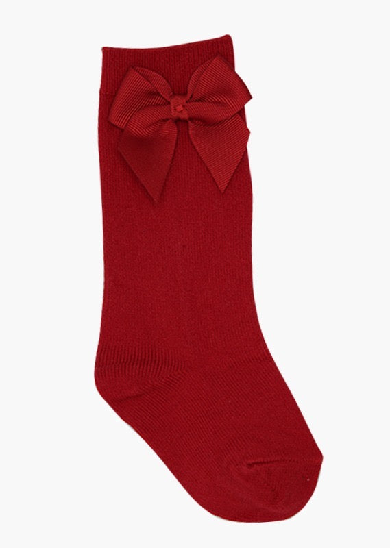 calceta alta con moño marca babine