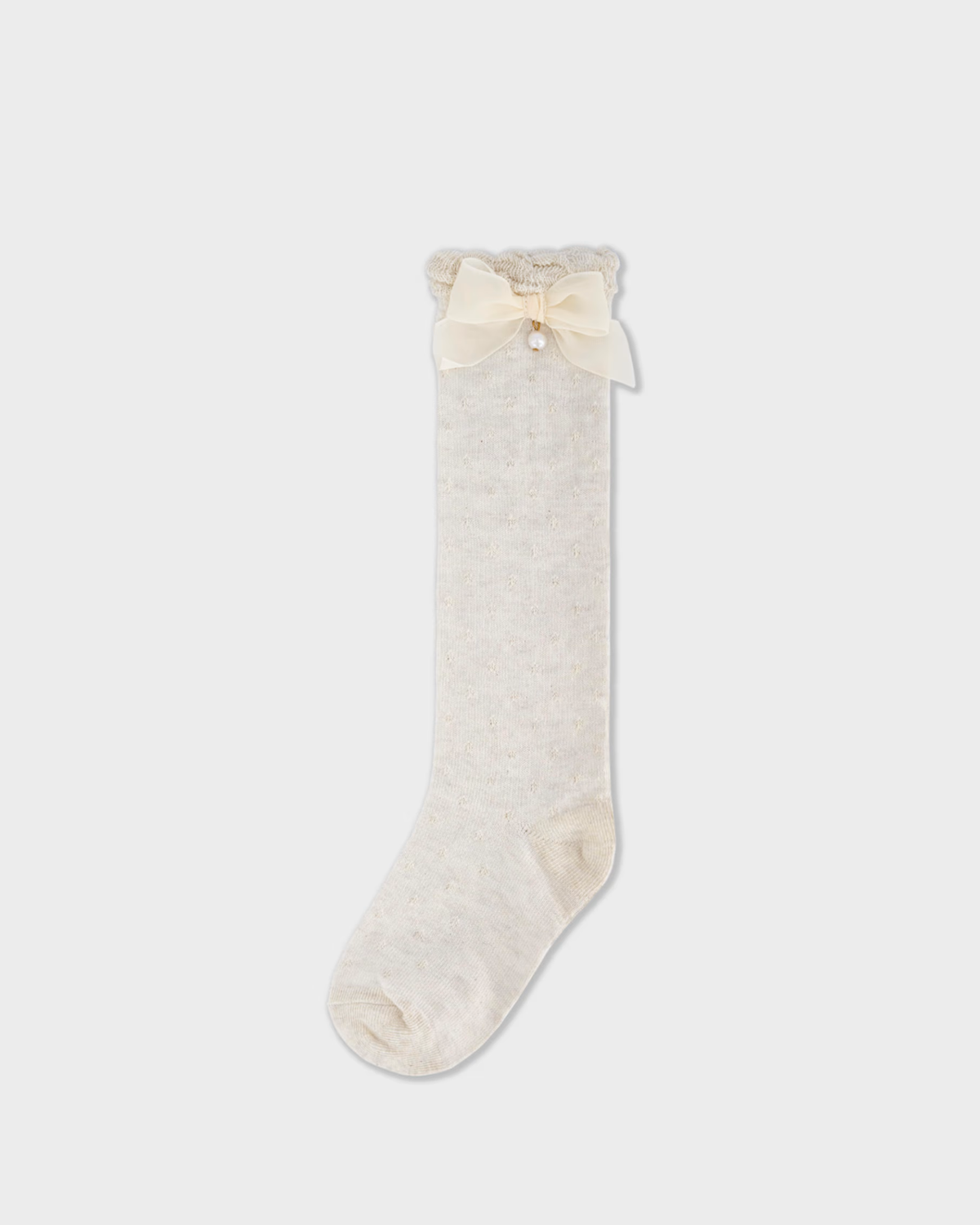 calceta alta con moño decorativo color beige milk