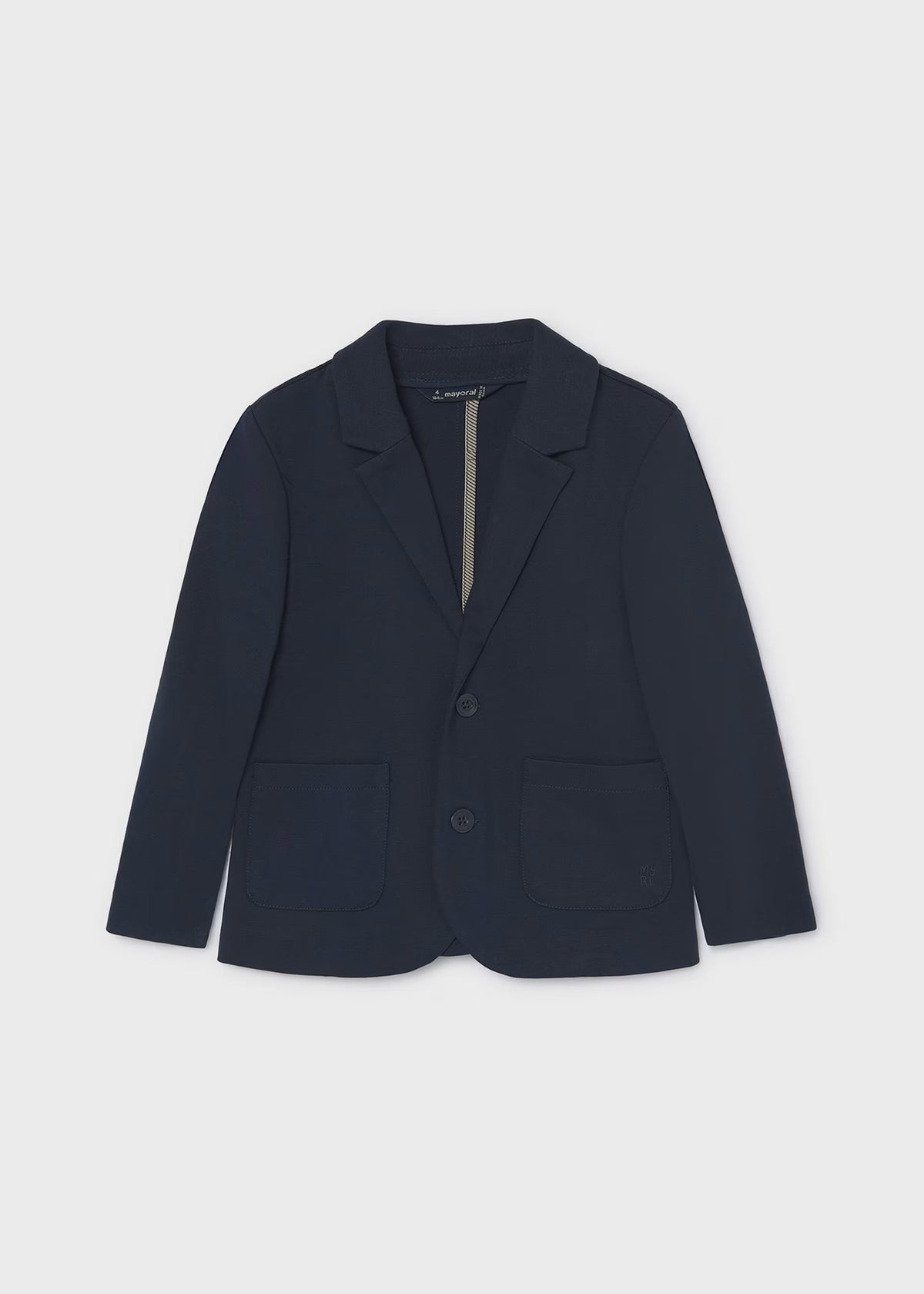 Chaqueta para niño. Bolsillos delanteros. Botones en la parte delantera.