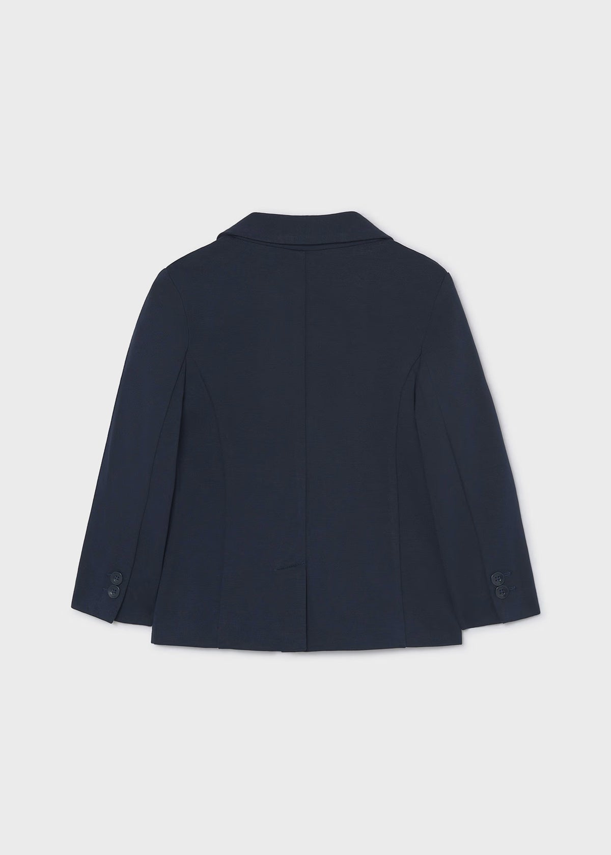 Chaqueta para niño. Bolsillos delanteros. Botones en la parte delantera.