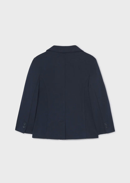 Chaqueta para niño. Bolsillos delanteros. Botones en la parte delantera.