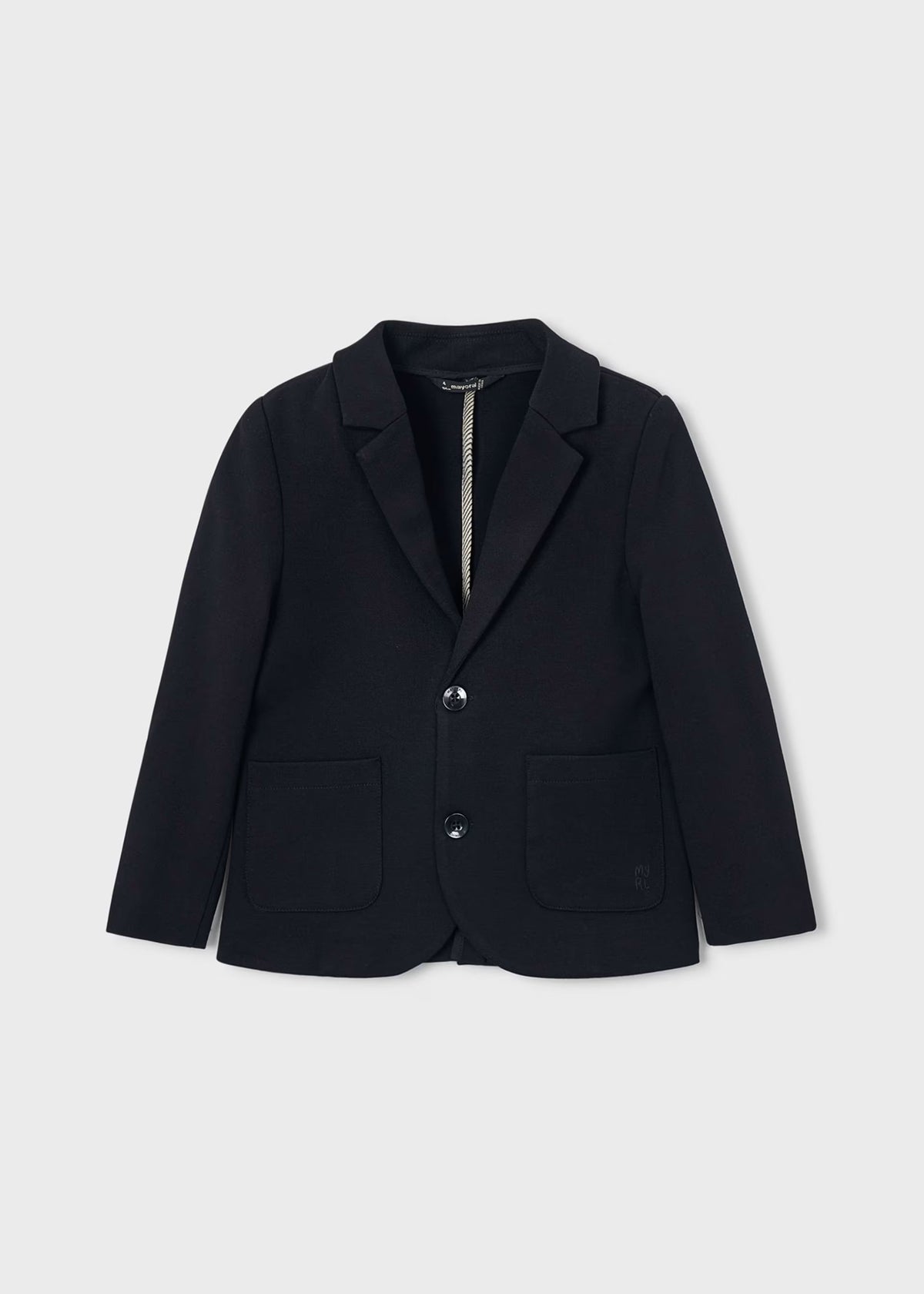 Chaqueta para niño. Bolsillos delanteros. Botones en la parte delantera.