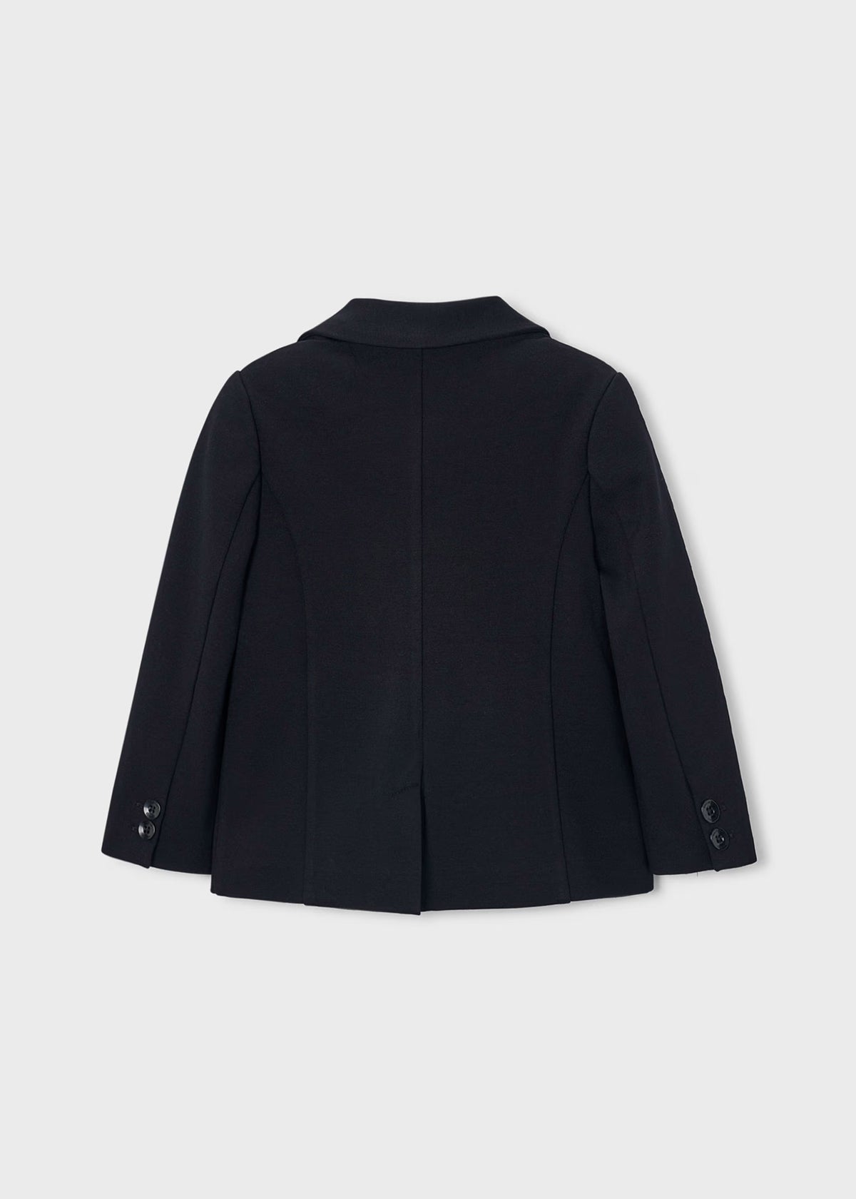 Chaqueta para niño. Bolsillos delanteros. Botones en la parte delantera.