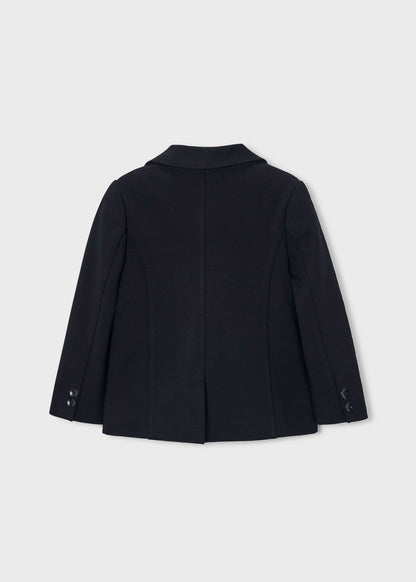 Chaqueta para niño. Bolsillos delanteros. Botones en la parte delantera.