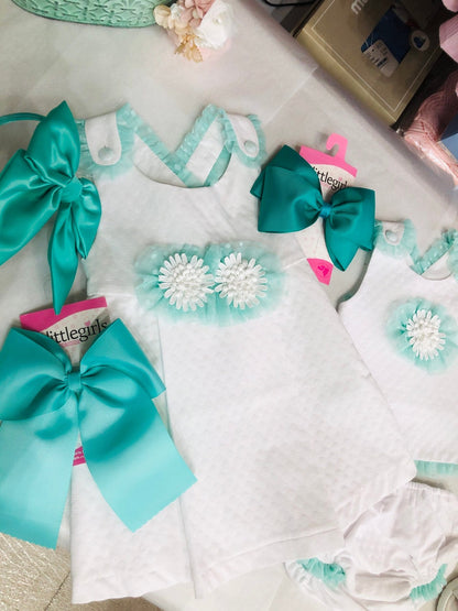 conjunto vestido y cubre pañal babine con verde esmeralda